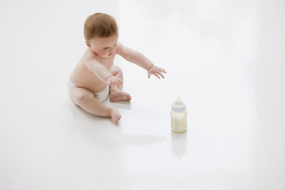 Baby Reaching for Bottle