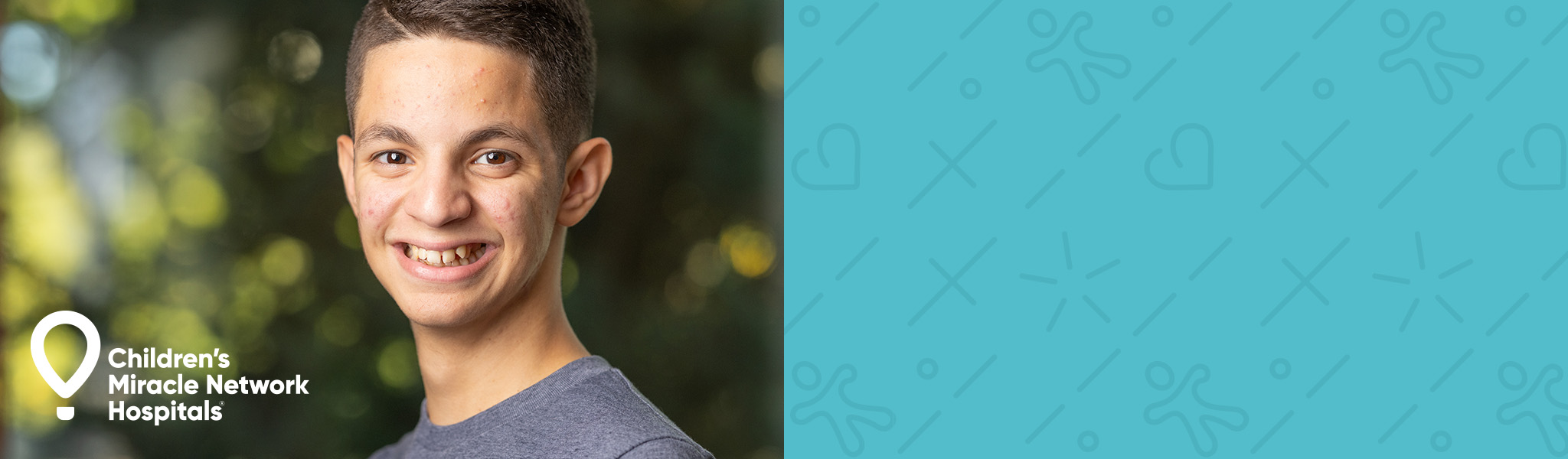 Boy smiling next to text saying 'Children's Miracle Network Hospitals'