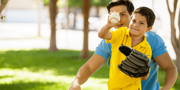 Father and son playing baseball