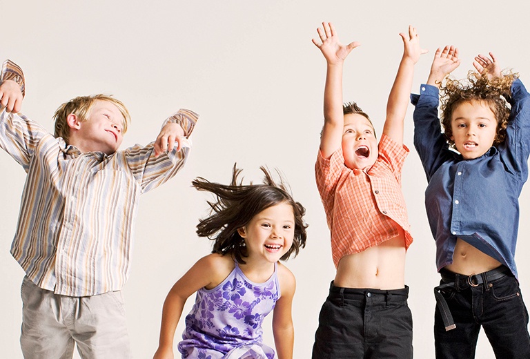 Four children jumping