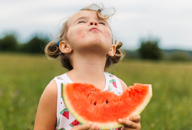 Girl eating watermelon