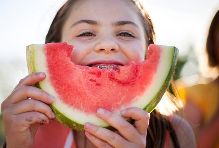 Girl eating watermelon