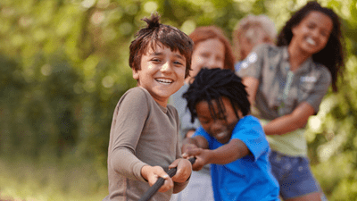 Kids play tug of war