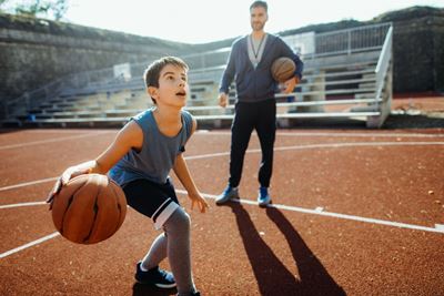 Boy at basketball practice