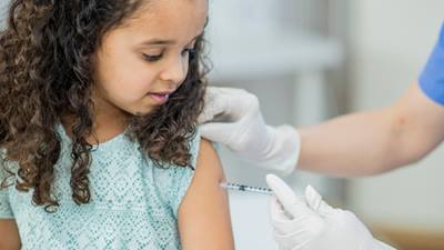 Girl getting vaccination