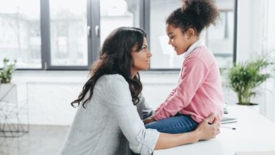 Mother and daughter talking