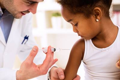 African American Girl getting Vaccine