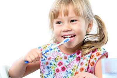 Girl Brushing Teeth