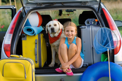 Girl and Dog Traveling