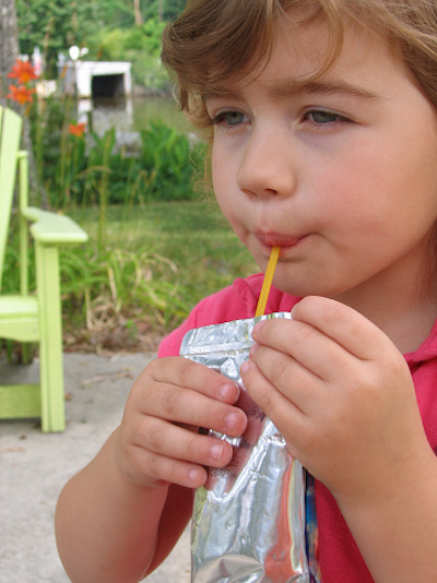 Girl Drinking Juice Box