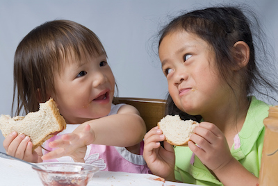 Girls eating PB&J