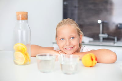 Girl with infused water bottle 