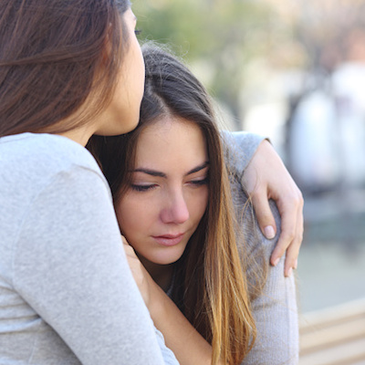 Mom Comforting Daughter