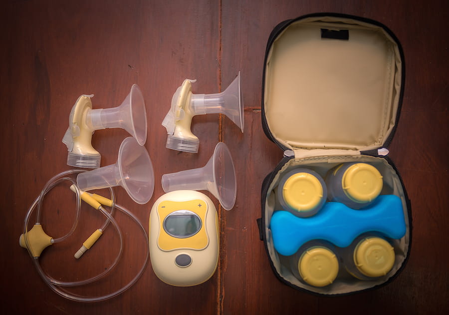 How should you clean your breast pump?