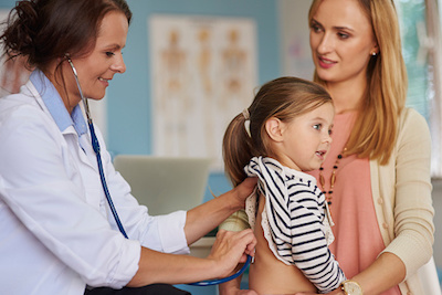 Child Being Seen by Pediatrician for Asthma