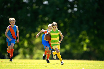 Kids Playing Football